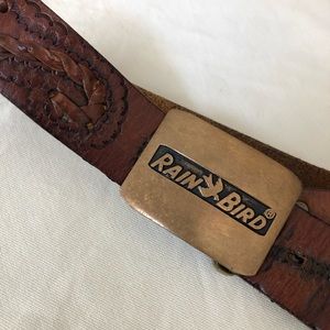 Vintage hand-tooled leather belt with brass buckle